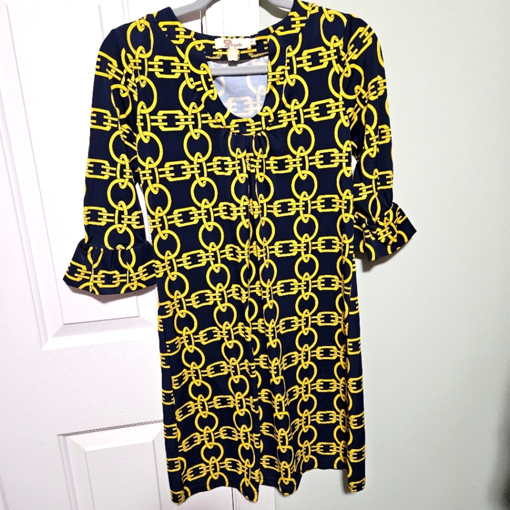 Small Aryeh dress is a must-have for any stylish woman's wardrobe.